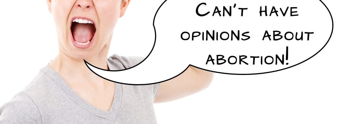 Angry woman yelling about pro-life men opposing abortion